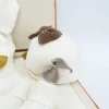 Le Coconnè Cappello Bianco con Fiocchi per Neonate